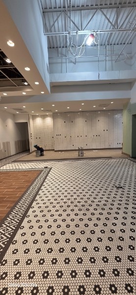 Commercial mosaic penny tile installation